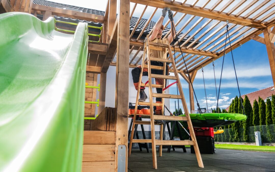 Jak stworzyć w ogrodzie bezpieczną i atrakcyjną strefę zabawy dla dziecka?